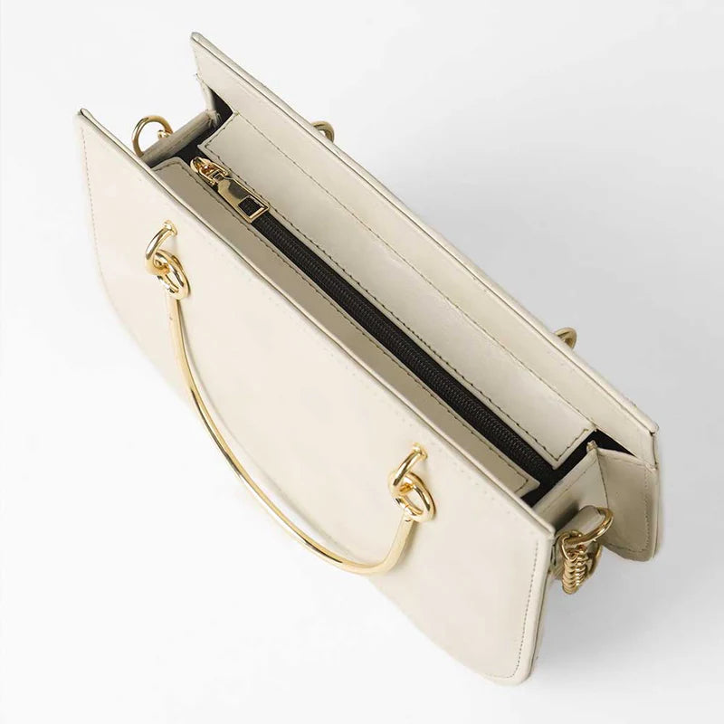 Beige Handbag with Gold Chain Strap and Metal Top Handles