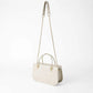 Beige Handbag with Gold Chain Strap and Metal Top Handles
