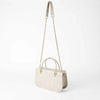 Beige Handbag with Gold Chain Strap and Metal Top Handles